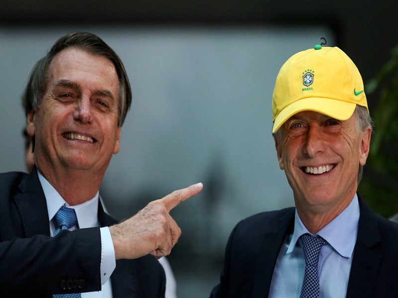 Os presidente Jair Bolsonaro e Maurício Macri. AGUSTIN MARCARIAN REUTERS